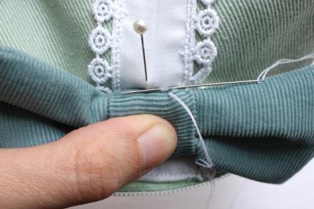 Use a running stitch to stitch the binding area of the bow to the bag. You Sew a Running Stitch by starting on the right side (if you re right handed) make a small horizontal stitch in the bag.