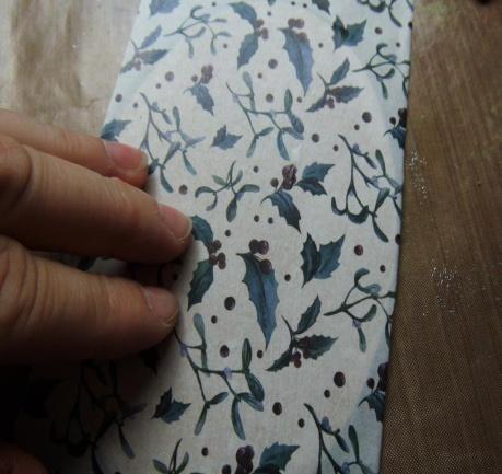 Step 13. Lay the oakwood decoupage paper over the glue sweeping the paper down smoothly as you go.