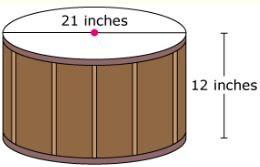 27,000 cm 3 28. The shape and measurements of a drum are shown below.
