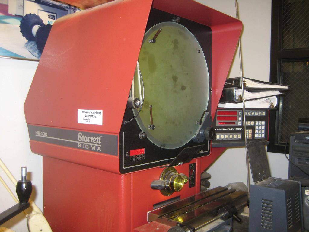 Figure 3.8: Optical comparator The second method of measuring the interlayer burr sizes involved finding the change in separation between the skin and the frame as a result of the drilling process.