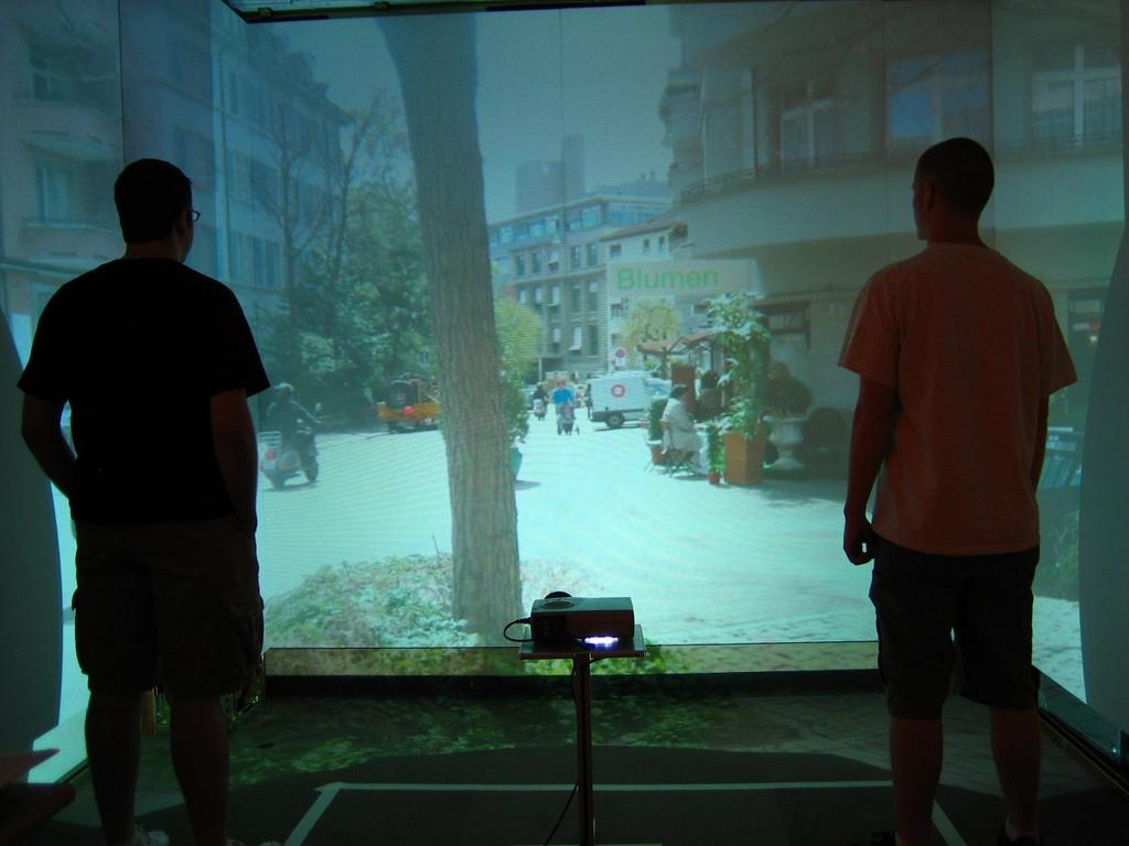 A Personal Surround Environment: Projective Display with Correction for Display Surface Geometry and Extreme Lens Distortion Tyler Johnson, Florian Gyarfas, Rick Skarbez, Herman Towles and Henry