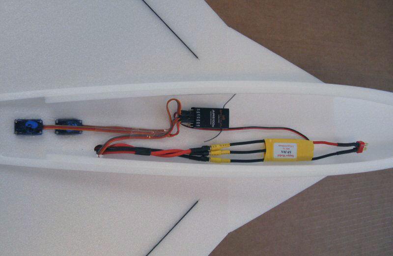 Photo above (top of plane) shows the motor extension wires coming up through the wing and attached to the ESC.
