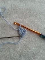 You can see my needle is showing you where that chain is as you make more stitches into it.