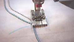 Corded Pintucks For corded pintucks, place a soft, heavy thread or cord under the fabric and between the needles.