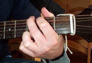 floor) you play the 3 rd fret with your ring or pinky finger which ever one is easier for you! The Next open chord we will learn is the C Chord.