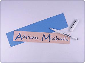 7. Print out the child s name onto the lightest color beige cardstock using a blue script font. 8. Using Scotch Precision Cutter cut out the title about 9 inches wide x 2-1/2 inches long.