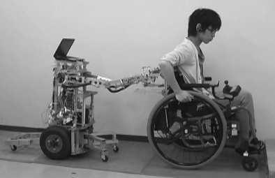 The wheelchair user and the robot were placed on one floor of the Toyama National College of Technology, and the robot operator was on another floor of the same building.