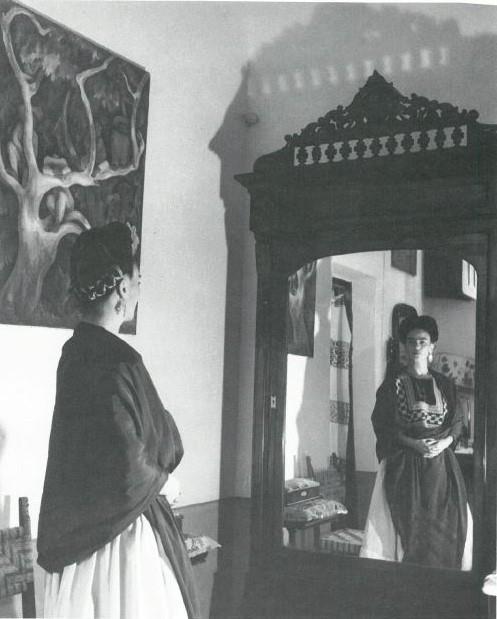 Title: Frida In Front Of Mirrored Wardrobe Keeper Date of Creation: 1945 Artist/Designer: Lola Álvarez Bravo Nationality of Artist/Designer: Mexican Material/Medium: Gelatin silver print Framed