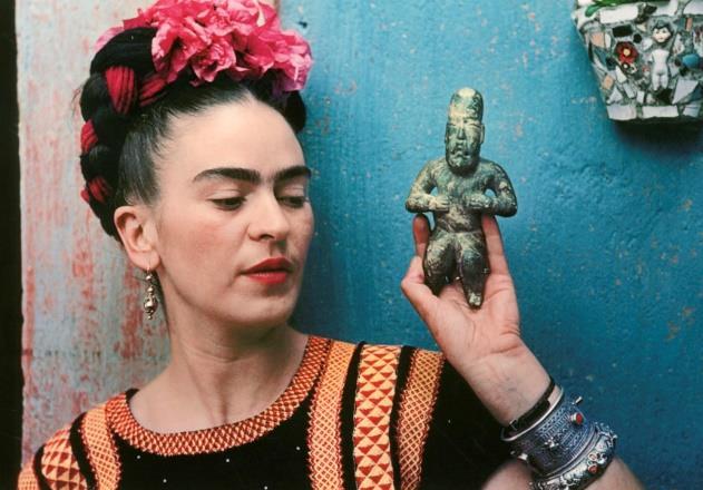 Title: Frida, with Olmeca Figurine, Coyoacan Date of Creation: 1939, printed later in 1991 Artist/Designer: Nickolas Muray Nationality of Artist/Designer: Hungarian-born America (USA)