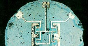 The Integrated Circuit (IC) An IC consists of interconnected electronic components in a single piece ( chip ) of