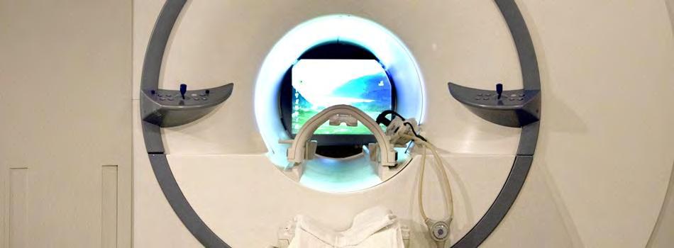 We will practice lying down and being still inside a pretend brain scanner. This is a picture of what it looks like! This looks just like the real MRI machine!