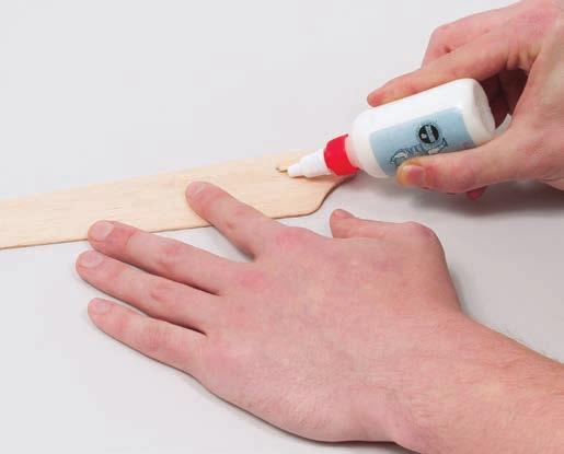Put a line of glue into the middle of a balsa blade and glue the rod to it (Figure 13).