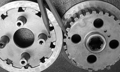 clutch pressure disc until the two components seat correctly with no clearance between them. CC40D 15.