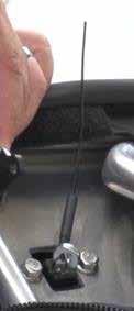24) Slide shrink wrap tubing onto door handle cable.