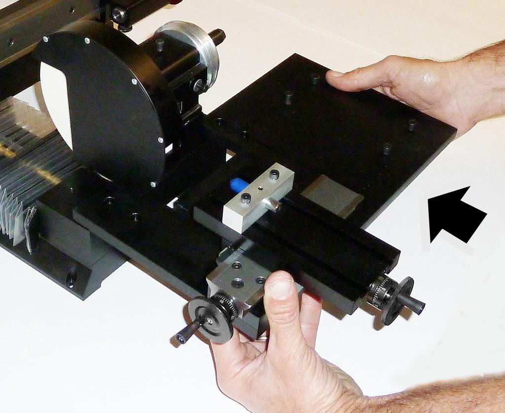 A B Fig. 9 (A) Sliding the motor/dresser plate into place. The last part of the insertion is a tight fit.