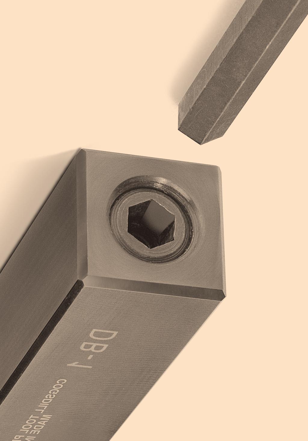 The tool is then fed into the workpiece an additional.002 or.003 inch (.05 or.08mm) to allow the diamond insert to become disengaged from the stop in the holder.