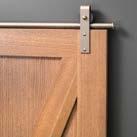 The materials in a Timbergate door are heavier than a hollow-core door, thus the Commercial Grade Ball