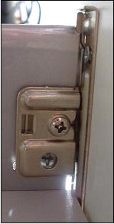 lock, as shown. Secure by tightening the screw shown, on the front lock, located on the inside of the drawer. 5.