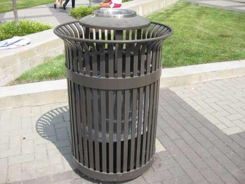 Surfaces and voids can be seen in the trashcan in the repeated metal strips that surround the canister.