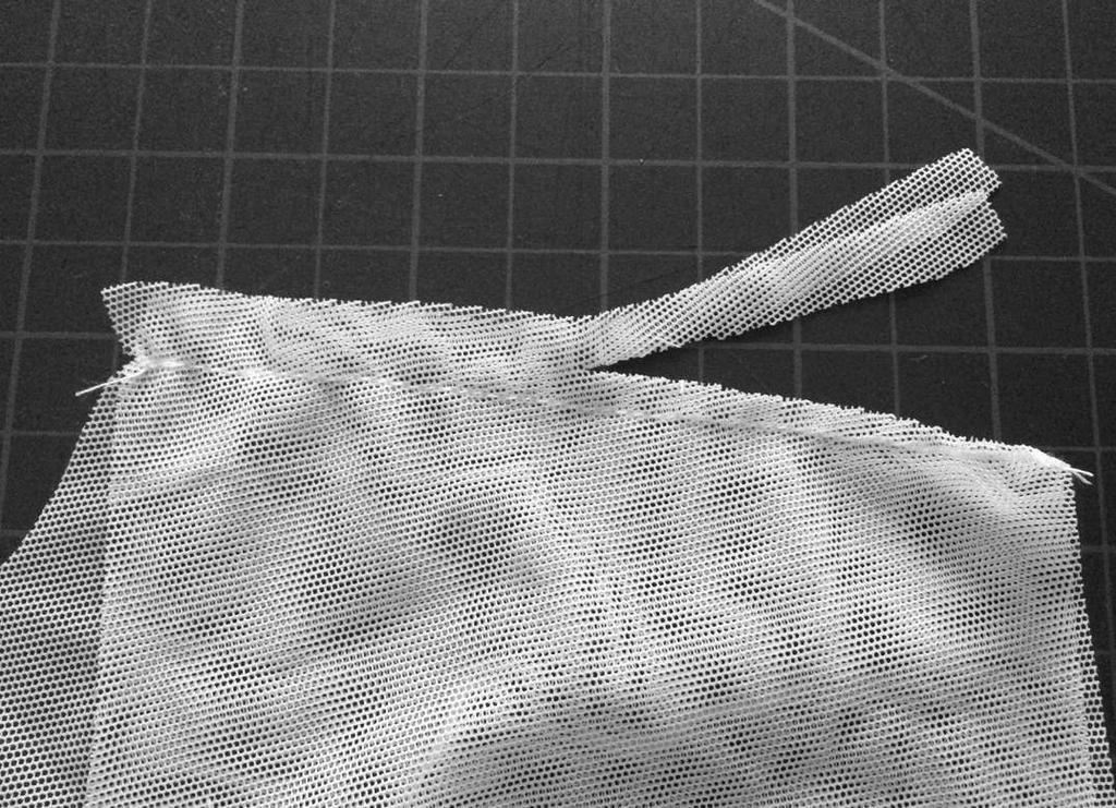 Reduce the seam allowance to 1/4 and finish the seam as you d like. You can also top-stitch along the seam to hold down the seam allowance. 4.