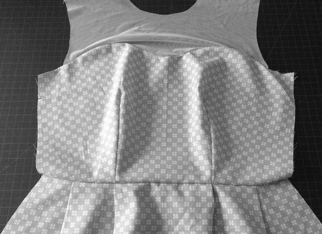 Press seam open, reduce seam allowance to 1/4 and finish if you d like. 3. Repeat for the BACK BODICE and BACK SKIRT pieces.