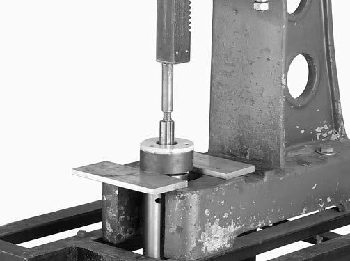 22. Place the cutterhead in an arbor press.