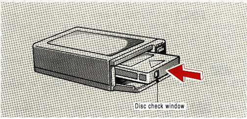 The player will skip any empty disc trays. Disk check window 4. Insert the magazine into the player with the disc check window facing you and close the cover. Be sure the cover is fully closed.
