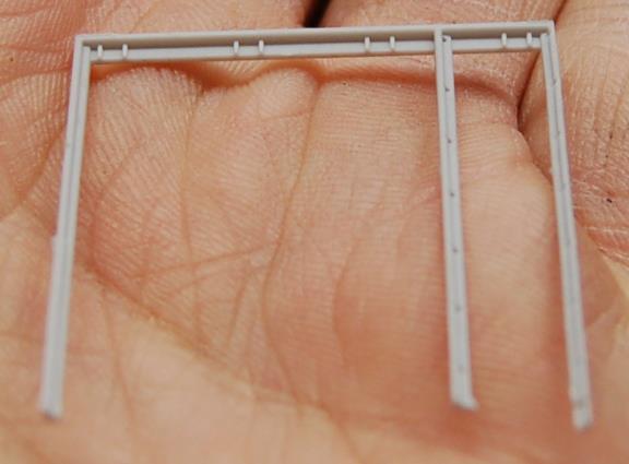 19. De-sprue and install the outer support frame. It has small slots at the top that aid in locating its position.