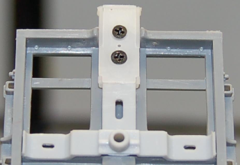 On the cushioned version (pictured below), there is a coupler spring that goes on the box cover.