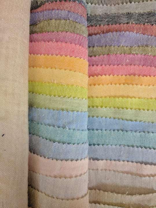 JE815W Woven colours 100% Linen Approx. Weight: 225gsm 1. Nude (Across top) 2. Buttermilk (not shown 3. Bare 4. Cloud 5. Savoy Pink 6. Thistle 7. Celeste 8. Iris 9. Pale apple 10.