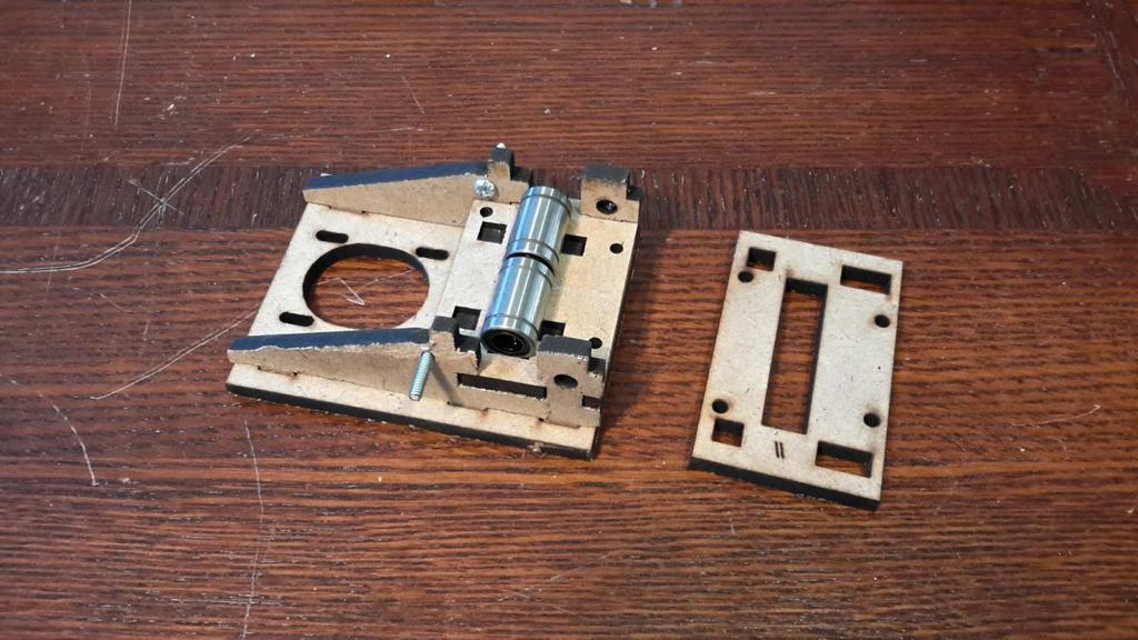 . Insert Z-axis nut and threaded rod into outside