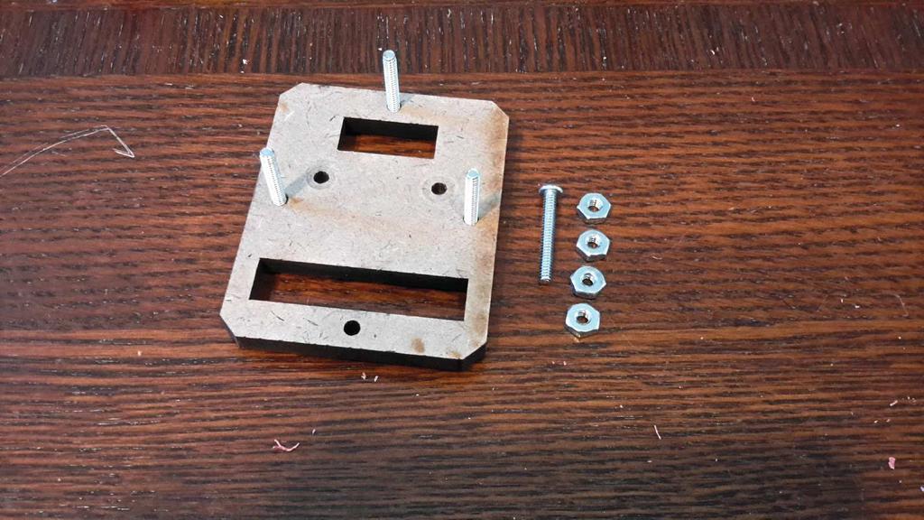 . Attach Extruder Body to (N1) using (2) 6-32 x 1-3/4" bolts.