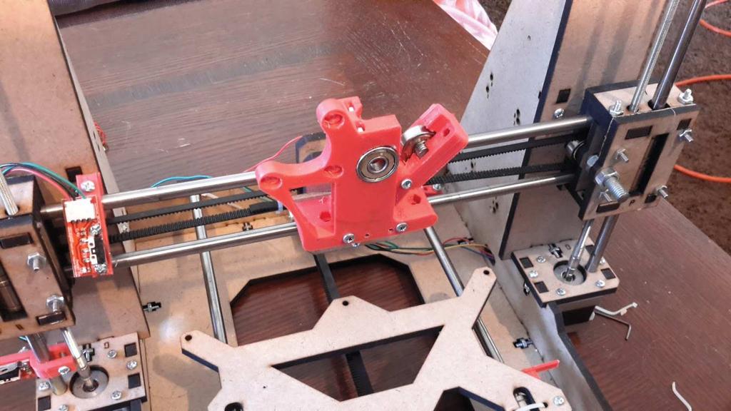 . Mount extruder motor with (3) M3 x 10mm bolts, keep loose. 5. Attach extruder idler with (1) M3 x 25mm bolt. 6.