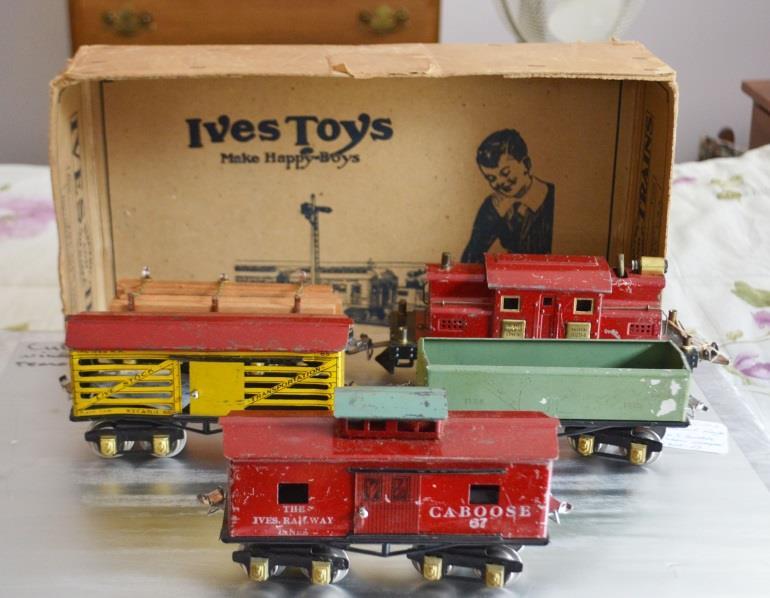 THE MYSTERY SIX - IVES PAINTED 0 GAUGE FREIGHTS, 1928, 29, 1930 BY Alan Grieme Why did IVES paint and rubber stamp a very, very limited number of 0 gauge freight cars that were normally lithographed