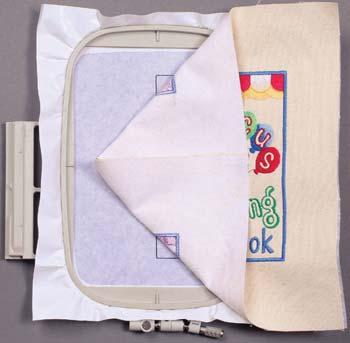 the eyelet tab design with each page design in the editing area of your embroidery machine