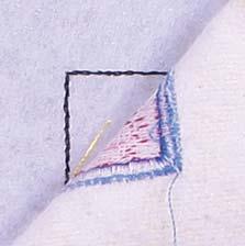 edge of the embroidered panel.