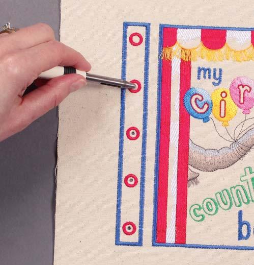 4. Assemble embroidered page panels into pairs: Punch