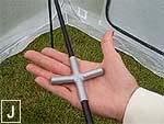 Knot the rope around a stake and insert it in the ground at a 45 angle.