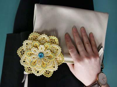 too! A Plain Jane purse gets an instant update when adorned with a lace flower;