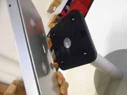 4) Insert ipad in Clamshell and feed cord through hole in Clamshell then out base of Post. See detail.