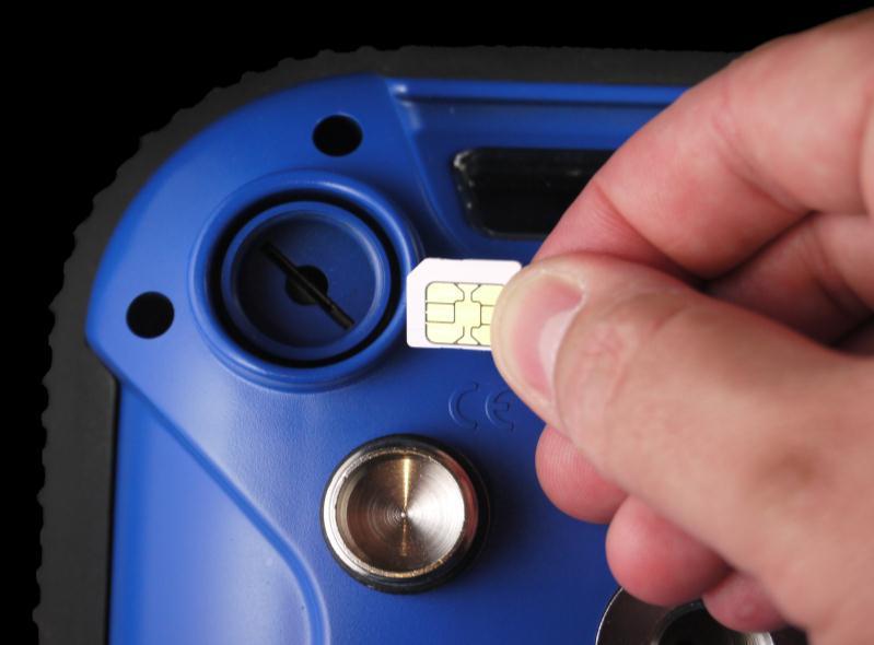 SIM card slot - The SIM card compartment is under the housing, unscrew the steel cap using a coin. - Insert the SIM card into the slot as shown in the following image.