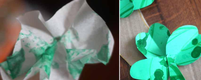 Shamrock Wreath cardboard scissors green paper tissue paper (white, orange, green) orange or green paint stapler Decorate green paper to your desire and cut out shamrocks.
