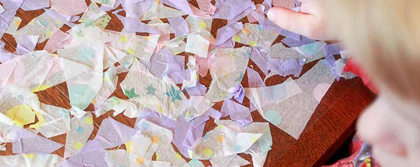 Contact Paper Tissue Flowers tissue paper scissors clear contact paper buttons hot glue pipe cleaners Have kids cut up different colors of tissue paper. Cut a piece of contact paper.