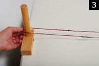 3) Cut off the yarn and tie the end to the apron rod. You have just measured two warp ends. (fig.