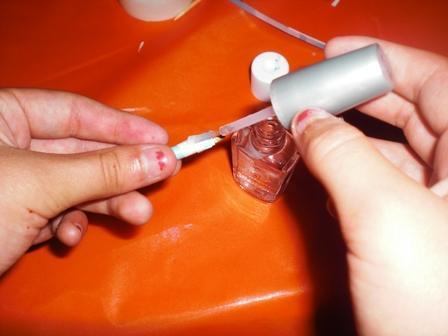 11. With clear nail polish, brush each bead. Set aside to let dry.