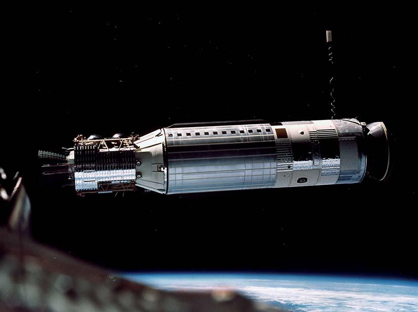 Above: Gemini 8 rendezvous with the unmanned Agena vehicle in orbit over Earth. Shortly after the two ships docked, they started to spin uncontrollably.