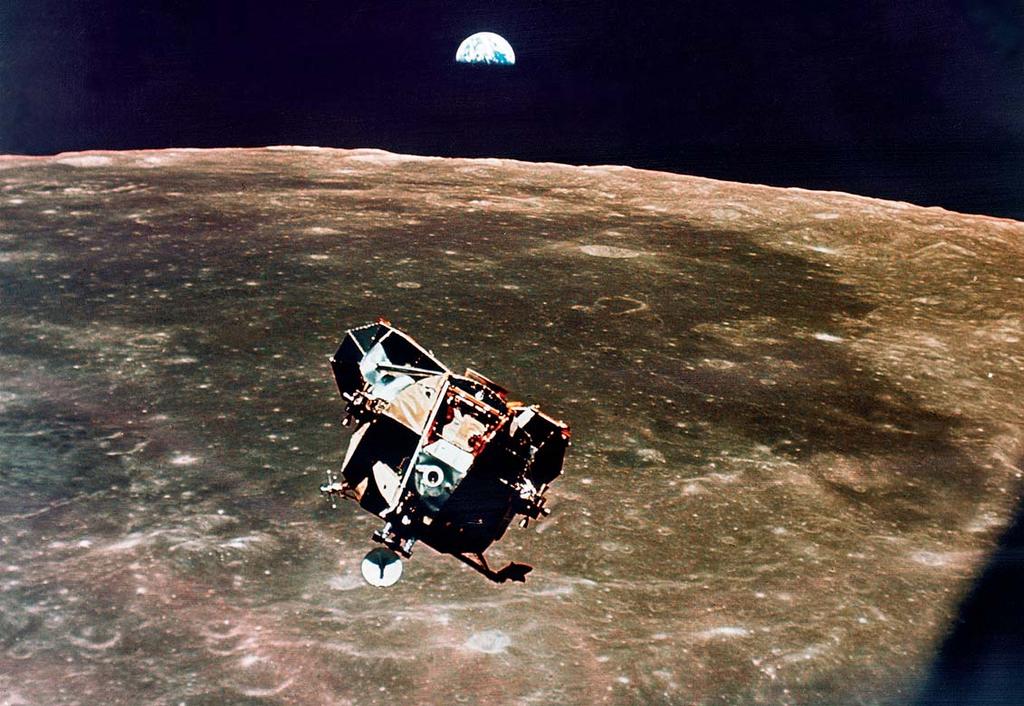 Above: The Eagle Lunar Module leaves Apollo 11 s Command Module Columbia on the way to the Moon s surface. The Earth rises in the background. On July 20, Eagle began its decent.