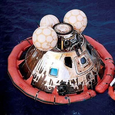 The Apollo Program Continues Below: The Apollo 13 Command Module is recovered. Against all odds, astronauts Jim Lovell, John Swigert and Fred Haise returned safely.