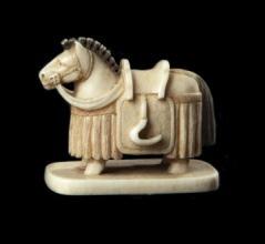 This tiny sculpture depicts a horse belonging to an historic Japanese warrior called a samurai (sam-ur-eye).