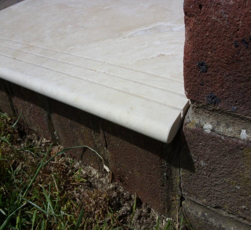 its possible to polish any seen exposed edging, rather than relying on tile trim or similar product to